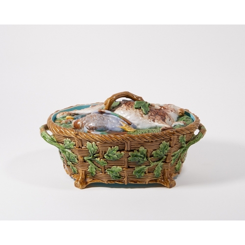 32 - A Minton majolica two-handled game pie tureen and cover, date code for 1874, impressed marks, the ov... 