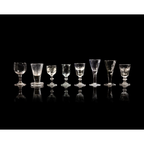 7 - A group of Georgian and later drinking glasses, comprising: a large firing glass, c.1750, the drawn ... 