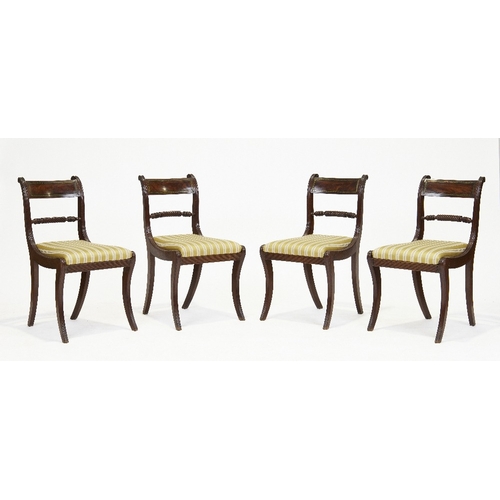 113 - A set of four Regency mahogany dining chairs, first quarter 19th century, the brass inlaid crest rai... 