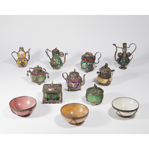27 - A collection of Chinese white-metal-mounted miniature decorative objects, 20th century, of various s... 