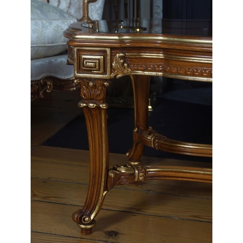 109 - CARVED AND PARCEL GILT COFFEE TABLE