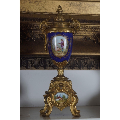 132 - 19TH-CENTURY PORCELAIN AND GILDED CLOCK SET