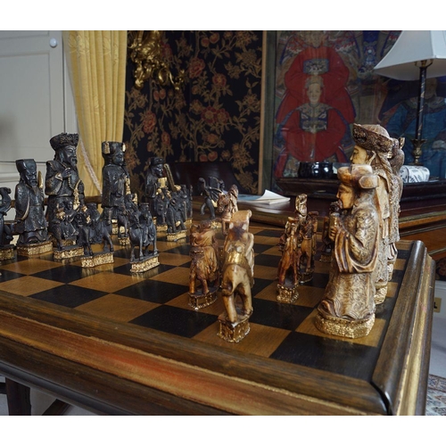 18 - CHESS TABLE AND 30 ANIMALIA AND FIGURAL PIECES