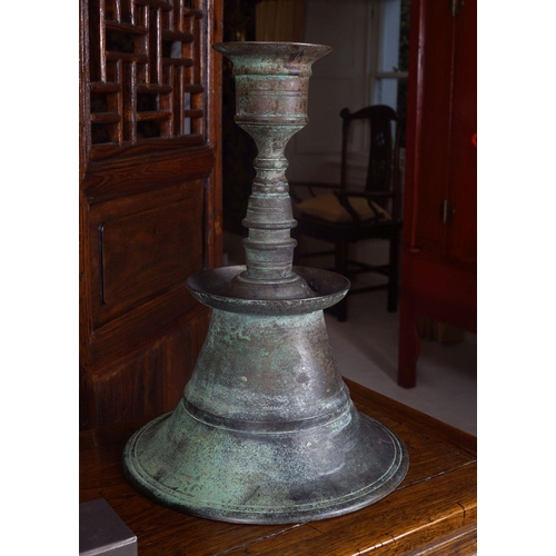 21 - PAIR OF CHINESE ARCHAISTIC BRONZE CANDLESTICKS