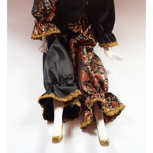 219 - HARLEQUIN PORCELAIN DOLL