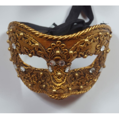 221 - GROUP OF FOUR VENETIAN MASKS