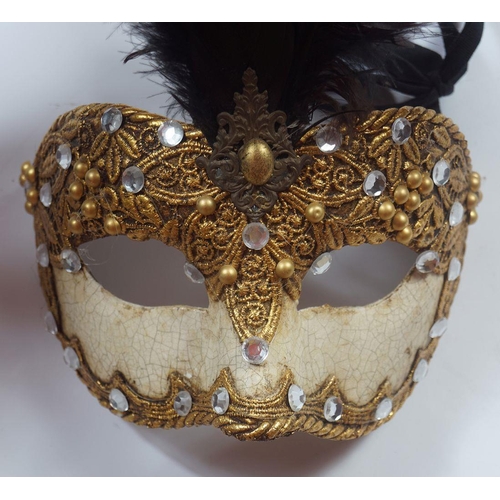 221 - GROUP OF FOUR VENETIAN MASKS