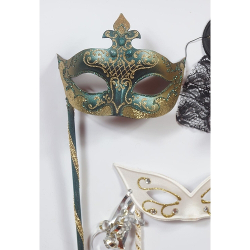 223 - LOT OF TWO HAND HELD VENETIAN MASKS