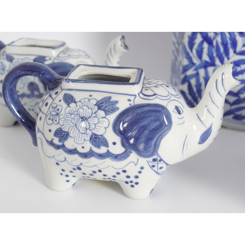 234 - FIVE ORIENTAL BLUE AND WHITE TEA POTS