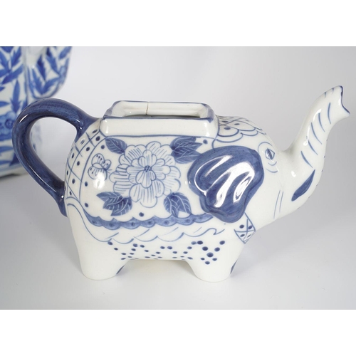 234 - FIVE ORIENTAL BLUE AND WHITE TEA POTS