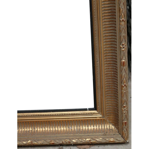 399 - LARGE MOLDED GILT FRAME