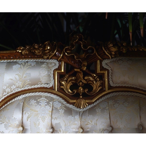 44 - PAIR OF CARVED AND PARCEL GILT SETTEES