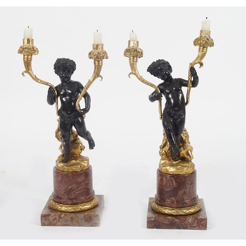 480 - PAIR OF REGENCY GILT BRONZE CHERUB STEMMED CANDELABRA