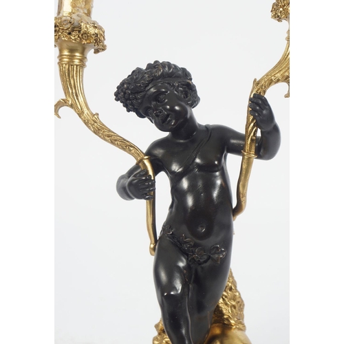 480 - PAIR OF REGENCY GILT BRONZE CHERUB STEMMED CANDELABRA