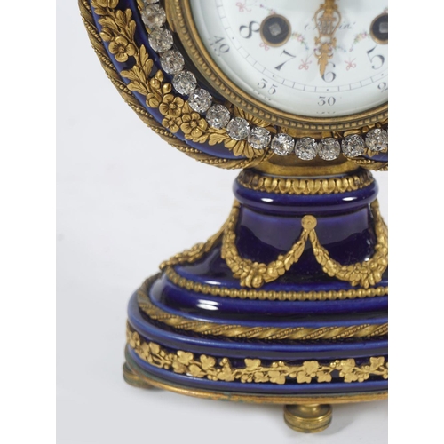 483 - 19TH-CENTURY PORCELAIN AND ORMOLU CLOCK