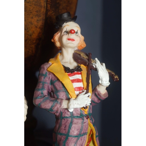 51 - GROUP OF FOUR CLOWN FIGURINES