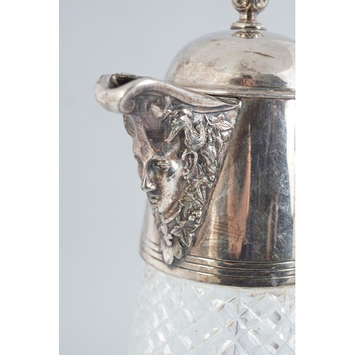 686 - CRYSTAL AND SILVER PLATED CLARET JUG