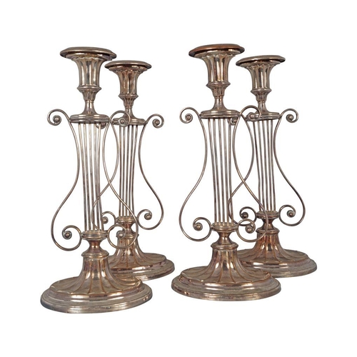 691 - SUITE OF FOUR SHEFFIELD LYRE STEMMED CANDLESTICKS