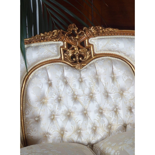 76 - PAIR OF CARVED AND PARCEL GILT SETTEES