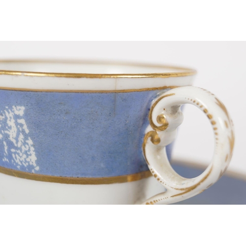139 - 18TH-CENTURY PORCELAIN PARCEL GILT CUP AND SAUCER