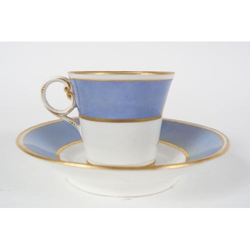 139 - 18TH-CENTURY PORCELAIN PARCEL GILT CUP AND SAUCER