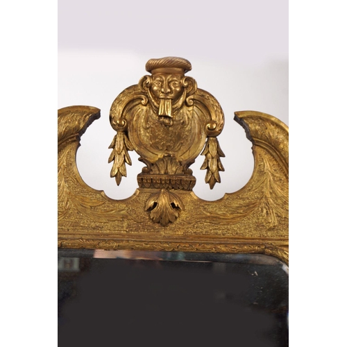 143 - 18TH-CENTURY IRISH CARVED GILT FRAMED MIRROR
