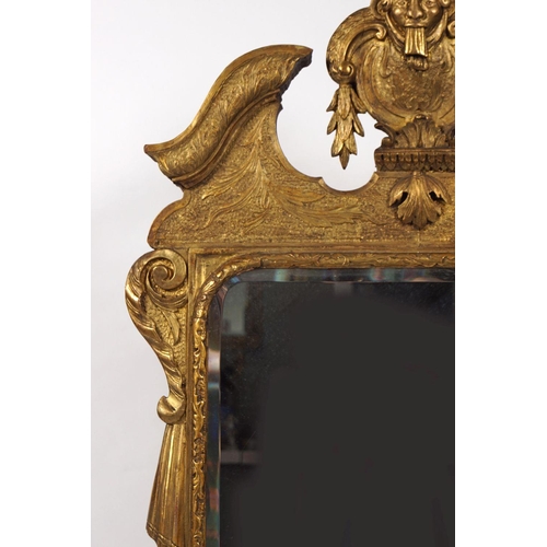 143 - 18TH-CENTURY IRISH CARVED GILT FRAMED MIRROR