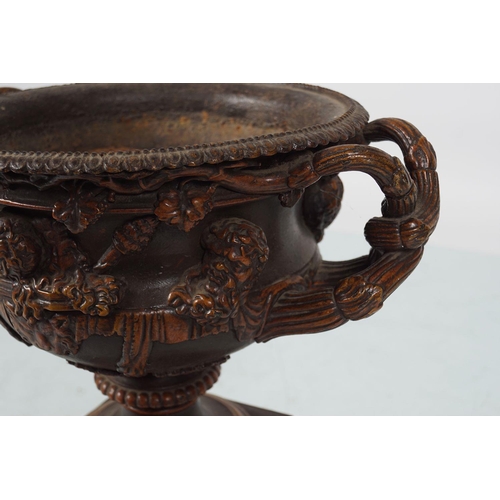 42 - 19TH-CENTURY CAST IRON WARWICK URN