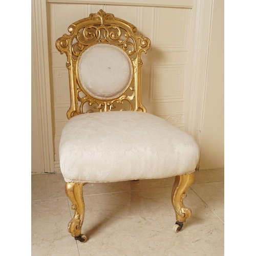 70 - 19TH-CENTURY CARVED GILTWOOD NURSING CHAIR