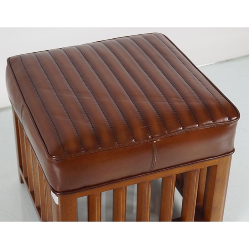 73 - DESIGNER LEATHER UPHOLSTERED STOOL