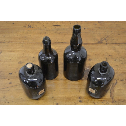 45 - COLLECTION OF FOUR EARLY  GLASS WINE BOTTLES