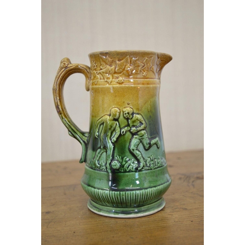 60 - GLAZED POTTERY JUG