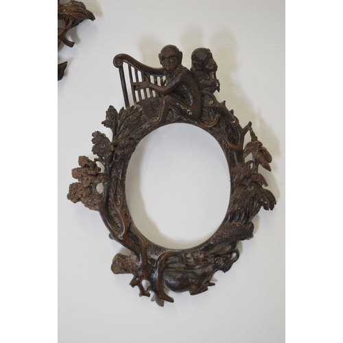 66 - PAIR OF CARVED WOOD FRAMES