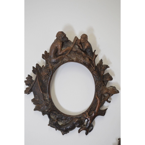 66 - PAIR OF CARVED WOOD FRAMES