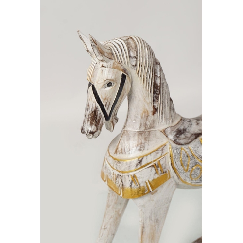 157 - CARVED PAINTED AND PARCEL-GILT ROCKING HORSE