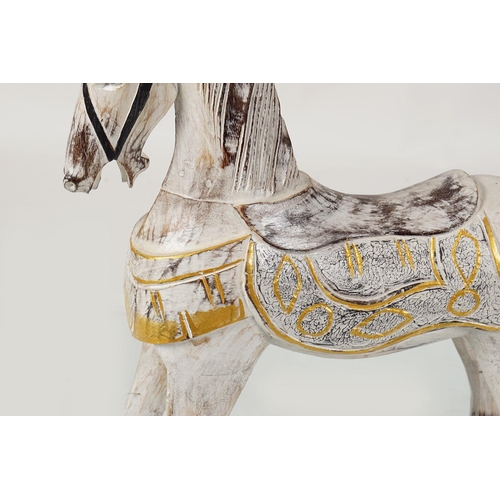 157 - CARVED PAINTED AND PARCEL-GILT ROCKING HORSE