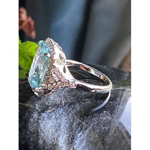 235 - 18 CT. WHITE GOLD AQUAMARINE & DIAMOND RING