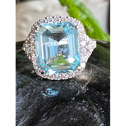 235 - 18 CT. WHITE GOLD AQUAMARINE & DIAMOND RING