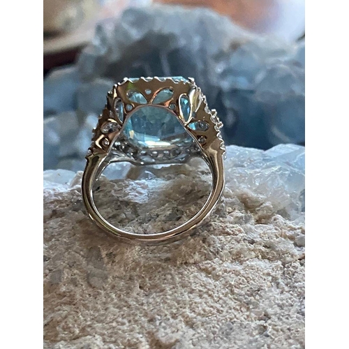 235 - 18 CT. WHITE GOLD AQUAMARINE & DIAMOND RING