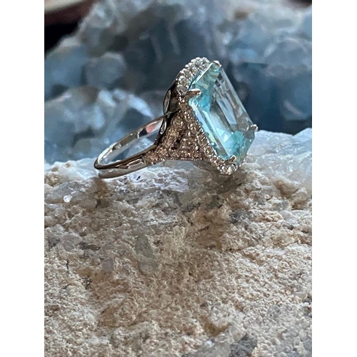 235 - 18 CT. WHITE GOLD AQUAMARINE & DIAMOND RING