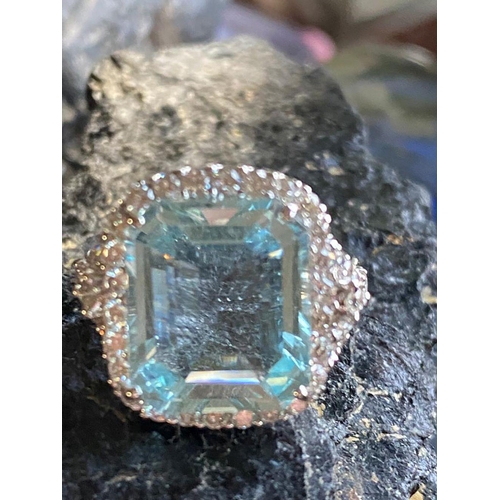 235 - 18 CT. WHITE GOLD AQUAMARINE & DIAMOND RING