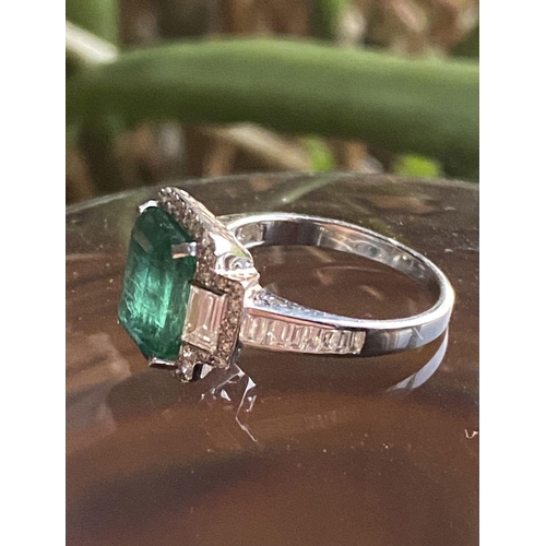 237 - 18CT. WHITE GOLD NATURAL COLOMBIAN EMERALD RING