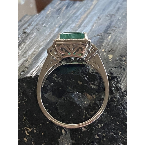 237 - 18CT. WHITE GOLD NATURAL COLOMBIAN EMERALD RING