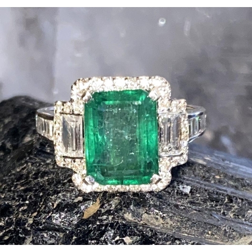 237 - 18CT. WHITE GOLD NATURAL COLOMBIAN EMERALD RING