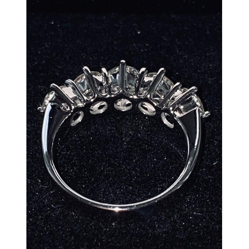 243 - 18 CT. WHITE GOLD 5 STONE DIAMOND RING