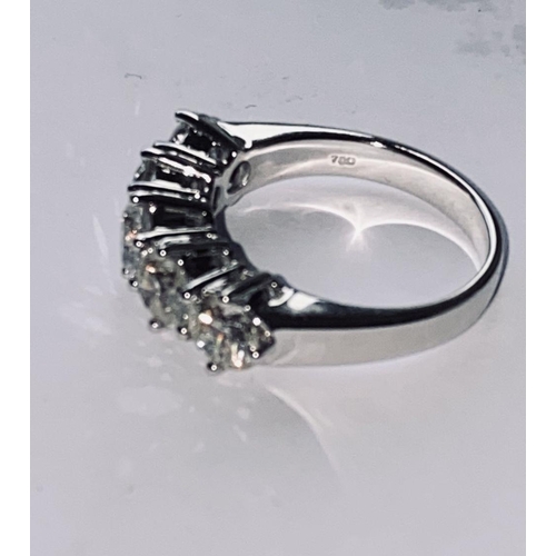 243 - 18 CT. WHITE GOLD 5 STONE DIAMOND RING