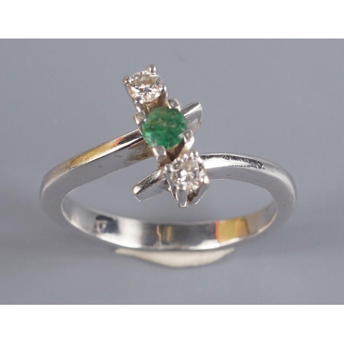 283 - 18 CT. WHITE GOLD & EMERALD DIAMOND RING