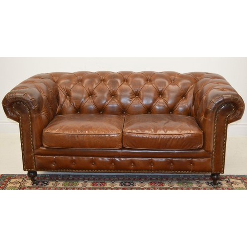 93 - LARGE HIDE UPHOLSTERED ROLL BACK SETTEE