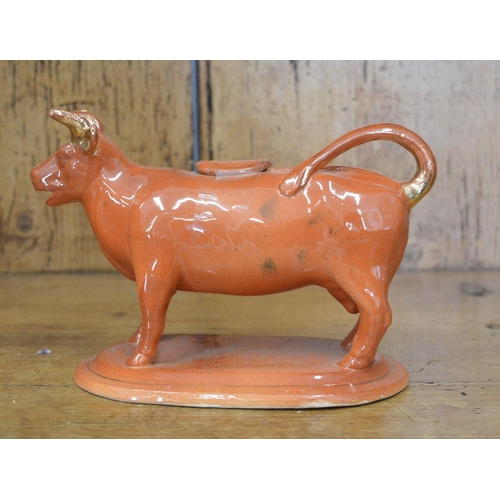 104 - 19TH-CENTURY POTTERY COW CREAMER