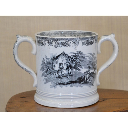 107 - LARGE TWO-HANDLED TRANSFER DECORATED MUG